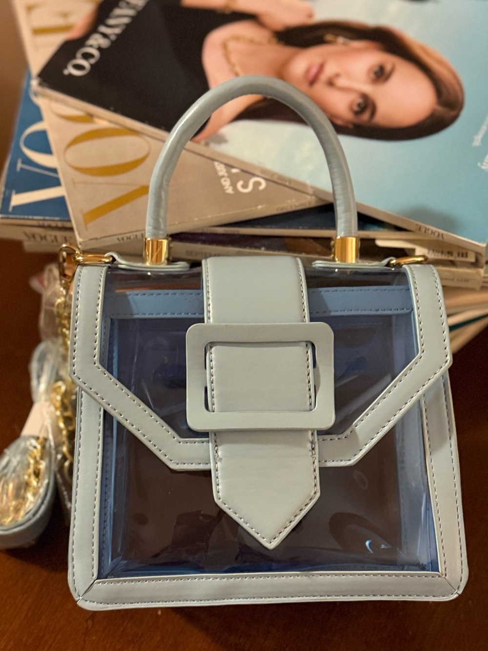 Light Blue Clear Top-Handle Satchel Bag & Cosmetic Products together!